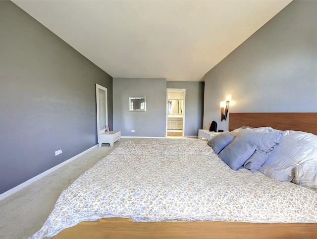 bedroom featuring baseboards, carpet, and ensuite bathroom
