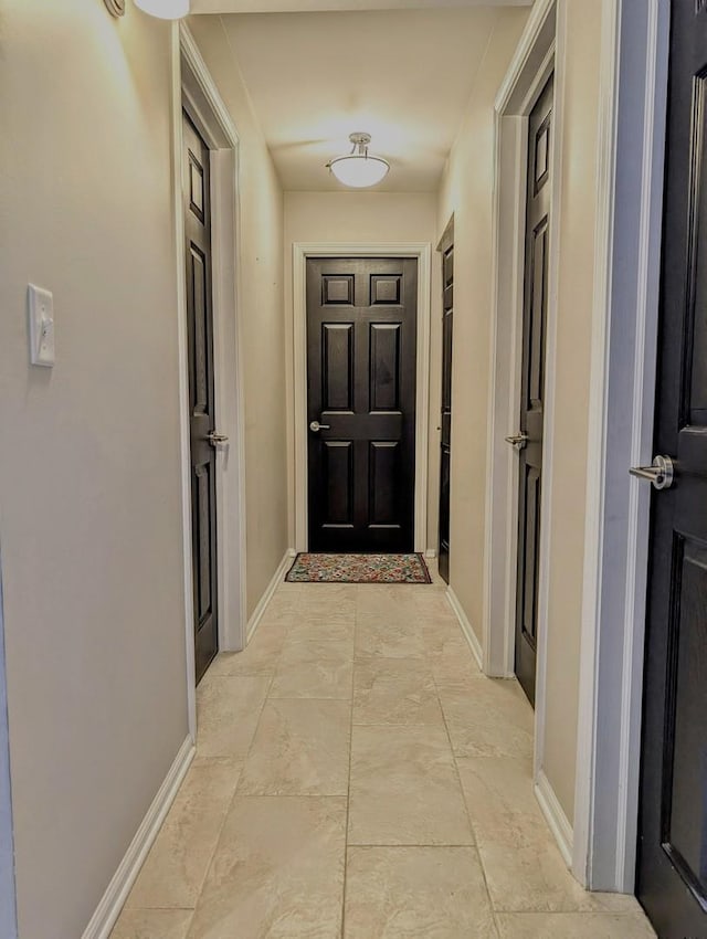 corridor with baseboards
