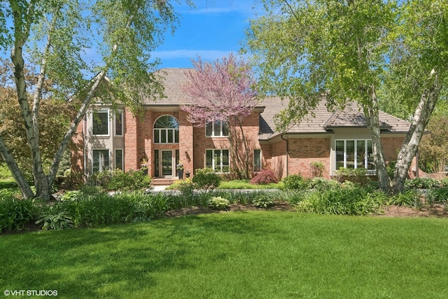 5632 Oakwood Cir, Long Grove, IL 60047 - view of front facade featuring a front lawn and brick siding