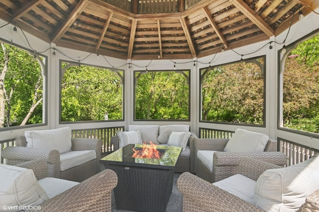 5632 Oakwood Cir, Long Grove, IL 60047 - sunroom / solarium with an outdoor living space with a fire pit and lofted ceiling