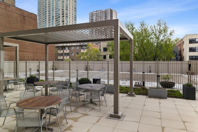 view of patio / terrace with fence