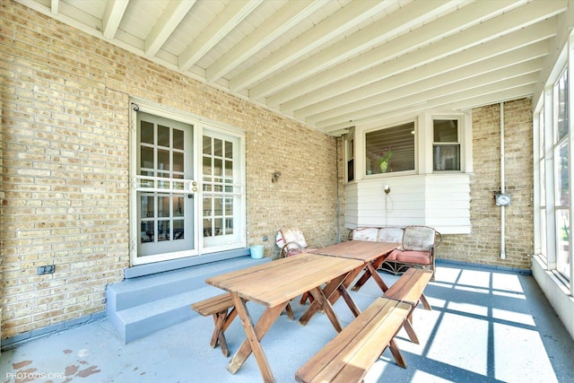 view of patio with french doors and outdoor dining space