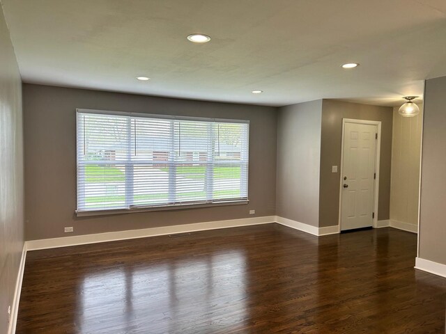 607 W Maude Ave, Arlington Heights, IL 60004 - spare room with healthy amount of natural light, dark wood-type flooring, baseboards, and recessed lighting
