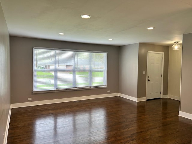 607 W Maude Ave, Arlington Heights, IL 60004 - spare room with healthy amount of natural light, dark wood-type flooring, baseboards, and recessed lighting