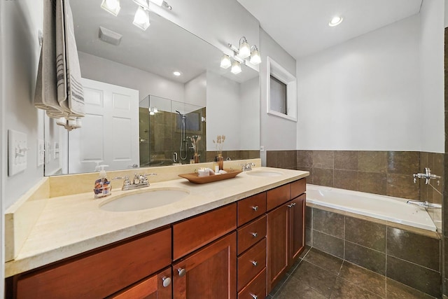 full bath with a shower stall, a bath, double vanity, tile patterned flooring, and recessed lighting