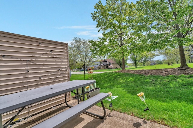 surrounding community with a lawn
