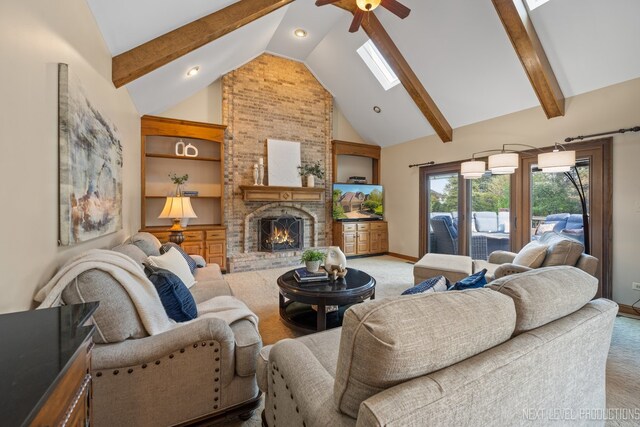 living room featuring ceiling fan, light colored carpet, high vaulted ceiling, a fireplace, and baseboards