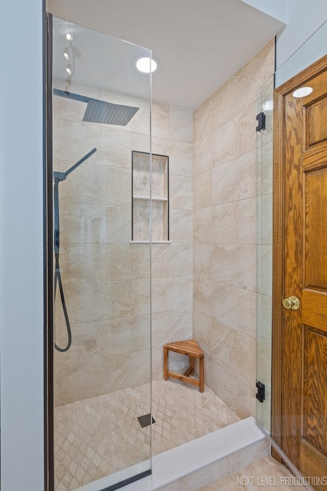 bathroom featuring a shower stall