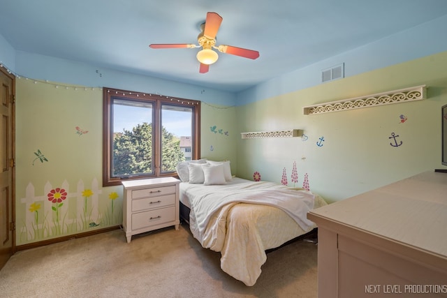 bedroom with light colored carpet and ceiling fan