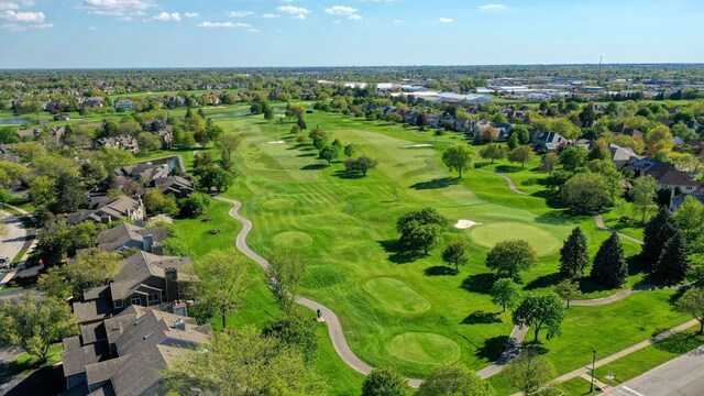 aerial view of residential area with a golf club