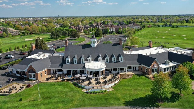 aerial view of residential area with a golf club
