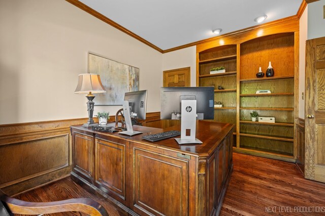 office area with crown molding, wainscoting, dark wood-type flooring, and wood walls