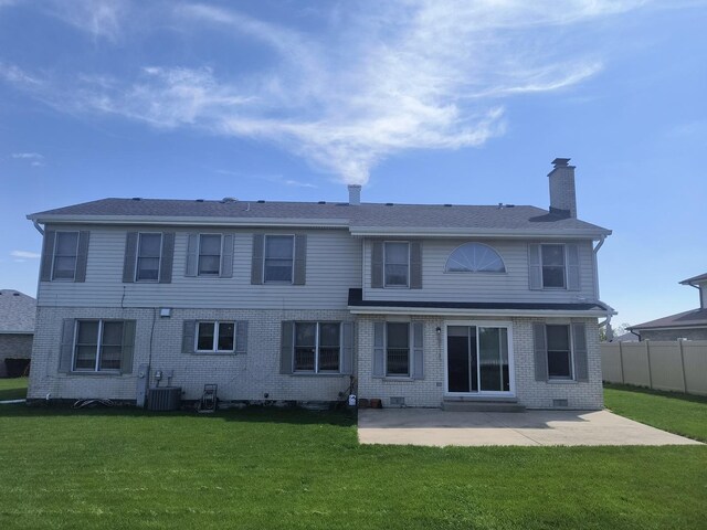 8730 Henry St, Orland Park, IL 60462 - back of house with a patio, brick siding, a chimney, and cooling unit