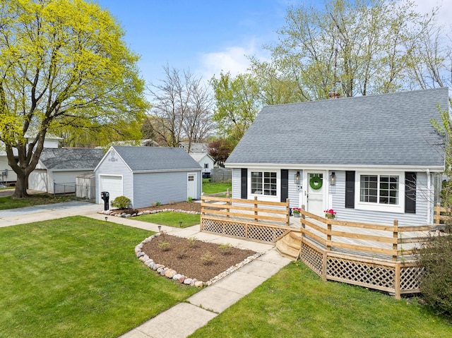 112 E Page St, Elkhorn, WI 53121 - view of front of property with roof with shingles, an outdoor structure, a deck, and a front yard