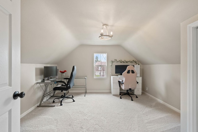 112 E Page St, Elkhorn, WI 53121 - carpeted home office featuring baseboards and lofted ceiling