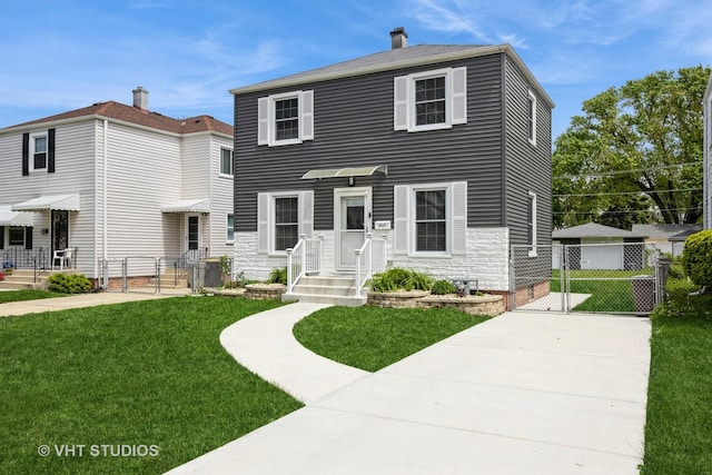 3917 Home Ave, Stickney, IL 60402 - view of front facade with a gate, a chimney, and stone siding