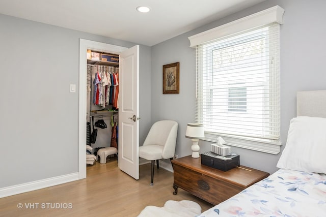 3917 Home Ave, Stickney, IL 60402 - bedroom featuring wood finished floors, a closet, a walk in closet, baseboards, and recessed lighting
