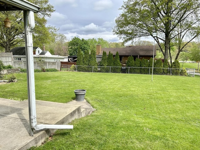 view of yard with fence