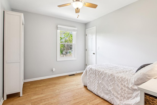 2825 Colonial Dr, Elgin, IL 60124 - bedroom featuring baseboards, light wood-style floors, and ceiling fan