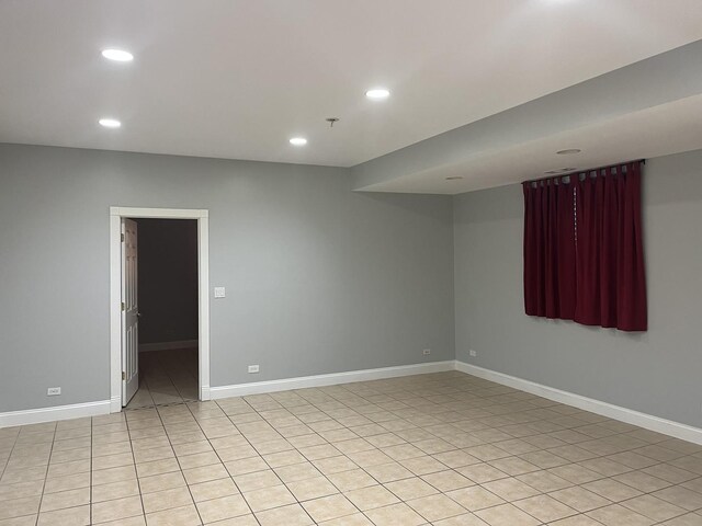 2126 N Kostner Ave, Chicago, IL 60639 - spare room featuring recessed lighting, baseboards, and light tile patterned floors