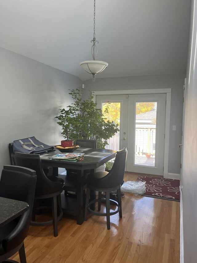 2126 N Kostner Ave, Chicago, IL 60639 - dining area featuring baseboards and wood finished floors