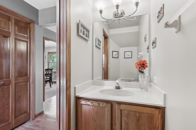 2835 Randall Ridge Ct, Elgin, IL 60124 - bathroom featuring a chandelier and vanity