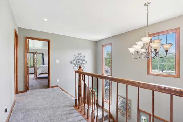 2835 Randall Ridge Ct, Elgin, IL 60124 - hall featuring plenty of natural light, a chandelier, carpet flooring, baseboards, and recessed lighting