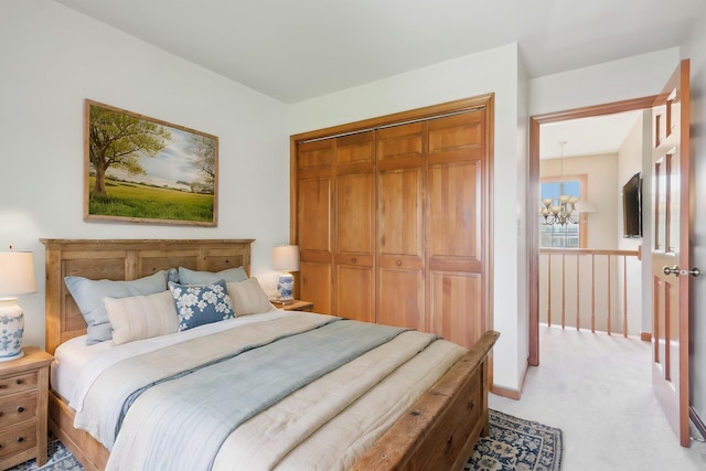 2835 Randall Ridge Ct, Elgin, IL 60124 - bedroom featuring a chandelier, a closet, and light carpet