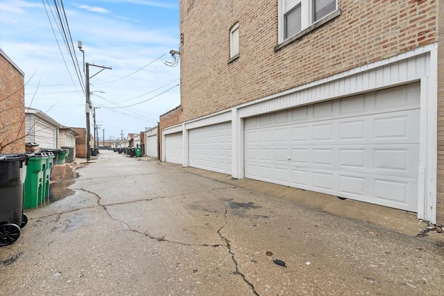 6401 23rd St Unit 2, Berwyn, IL 60402 - garage featuring aphalt driveway