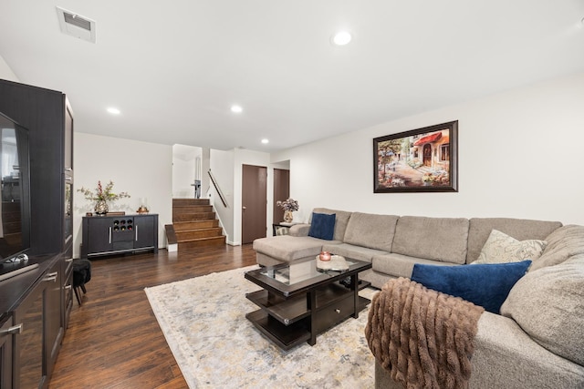 living area with stairway, recessed lighting, dark wood finished floors, and visible vents