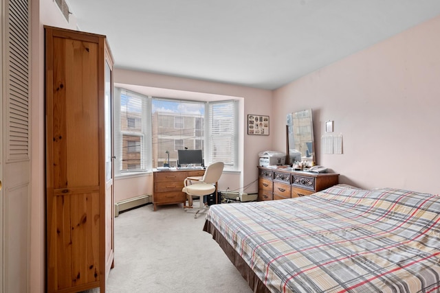 bedroom with a baseboard radiator, visible vents, and light colored carpet