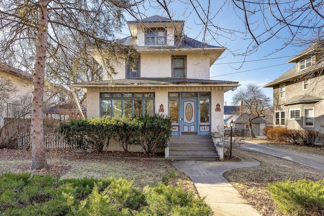 141 Park Ave, Dekalb, IL 60115 - traditional style home featuring stucco siding and fence