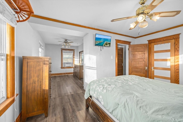 141 Park Ave, Dekalb, IL 60115 - bedroom featuring a ceiling fan, cooling unit, baseboards, ornamental molding, and dark wood-style floors