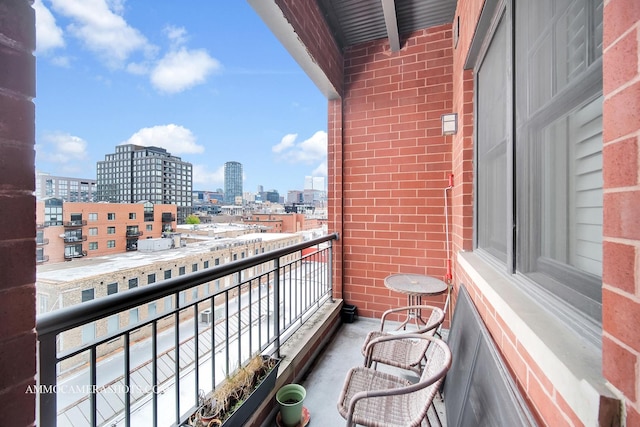balcony featuring a city view