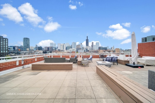 view of patio featuring an outdoor hangout area and a view of city