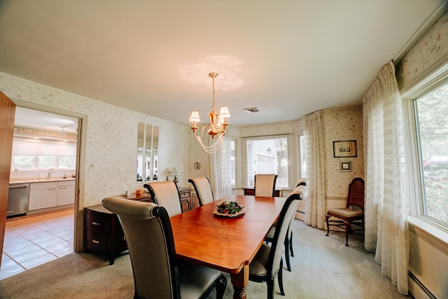 dining room with visible vents, a baseboard radiator, light carpet, a notable chandelier, and wallpapered walls