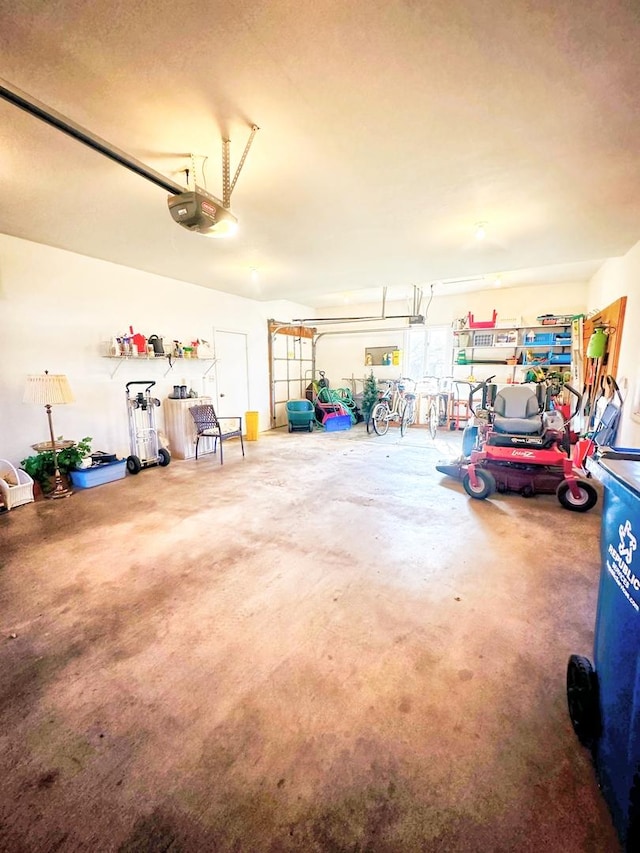 garage featuring a garage door opener