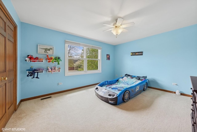 500 Easy St, Darien, IL 60561 - carpeted bedroom featuring baseboards, a closet, visible vents, and a ceiling fan