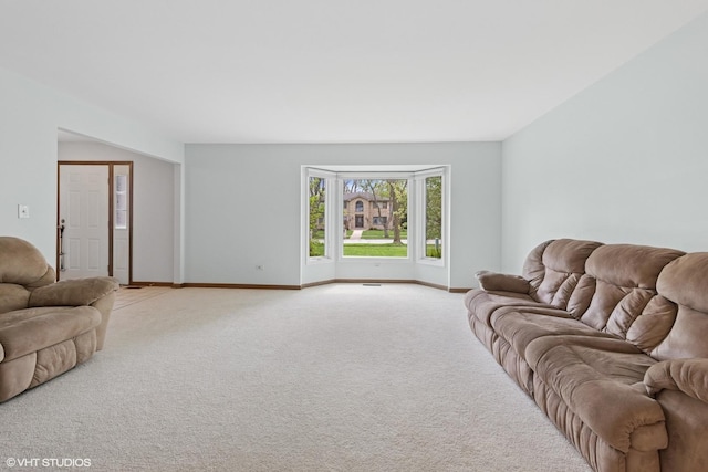 500 Easy St, Darien, IL 60561 - carpeted living area with baseboards