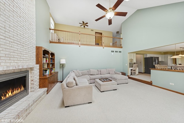 500 Easy St, Darien, IL 60561 - carpeted living area featuring a brick fireplace, baseboards, ceiling fan, and high vaulted ceiling