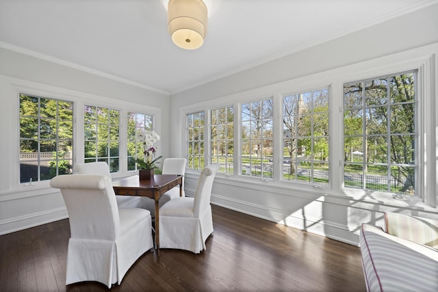 sunroom with ornamental molding, baseboards, french doors, and wood finished floors