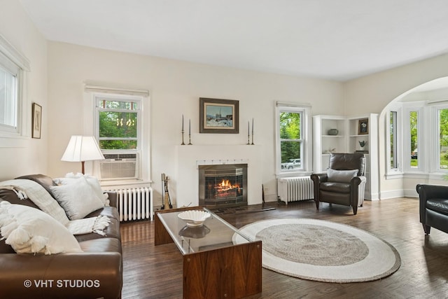 625 Greenbriar Ln, Lake Forest, IL 60045 - living room with radiator heating unit, healthy amount of natural light, and a tile fireplace