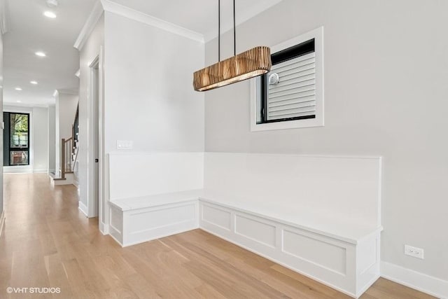 1928 W George St, Chicago, IL 60657 - hallway featuring light wood-type flooring, crown molding, recessed lighting, stairway, and a wainscoted wall
