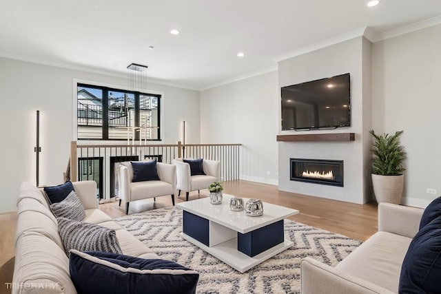 1928 W George St, Chicago, IL 60657 - living room with wood finished floors, a glass covered fireplace, recessed lighting, and crown molding