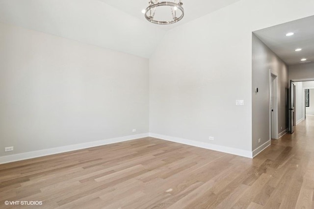1928 W George St, Chicago, IL 60657 - unfurnished room featuring a chandelier, light wood finished floors, recessed lighting, and vaulted ceiling
