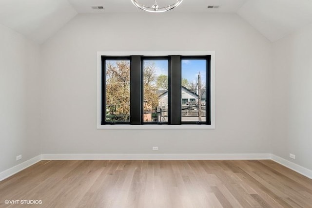 1928 W George St, Chicago, IL 60657 - bonus room with vaulted ceiling and light wood-style floors