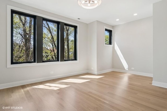 1928 W George St, Chicago, IL 60657 - spare room with light wood finished floors and recessed lighting