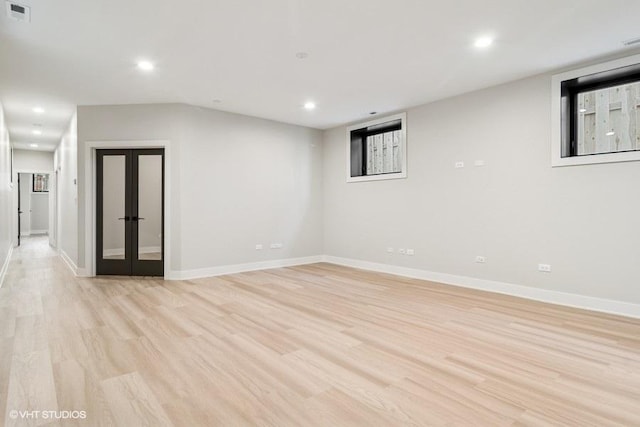 1928 W George St, Chicago, IL 60657 - spare room with light wood-type flooring, recessed lighting, and french doors