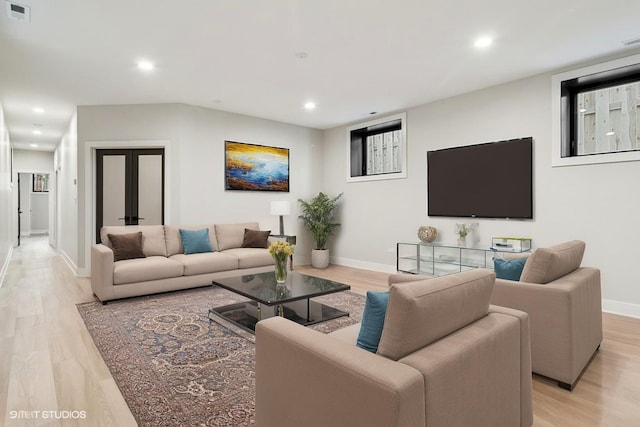 1928 W George St, Chicago, IL 60657 - living room featuring light wood-type flooring, recessed lighting, and french doors
