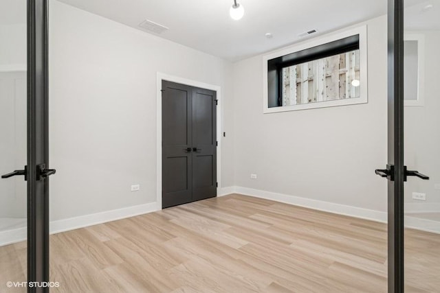 1928 W George St, Chicago, IL 60657 - unfurnished room featuring light wood finished floors and baseboards